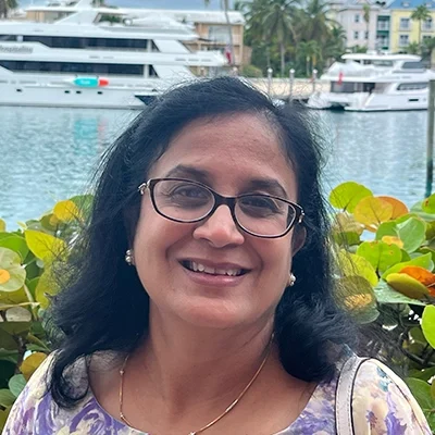 Licensed Optician Shruti Smiling Outdoors